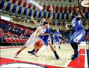 looking for an opening — John Caleb Sanders looks for space against Presbyterian. Photo credit: Leah Stauffer