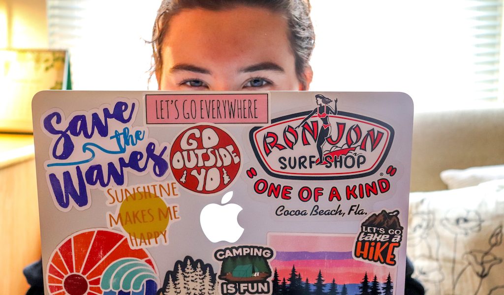 How students display decals on their laptops as a way to show