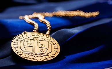 Close up photo of Liberty University's Presidential Medallion
