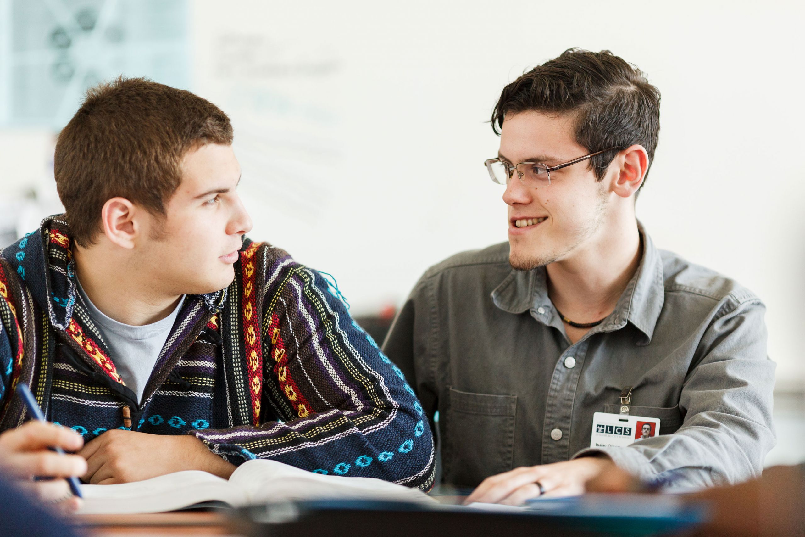 A high school student and Liberty University student interact through Beacon of Hope.