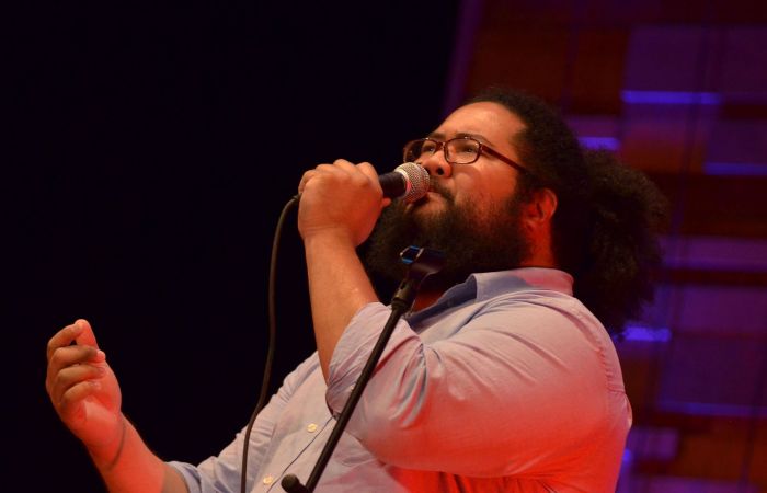 In front of a large crowd in a dim Nashville, Tenn., auditorium, blue and purple stage lights painted the stage as Setnick Sene (’15) commanded his rich, smooth voice.