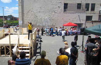 The Gospel message is preached during an evangelistic outreach event in Baltimore.