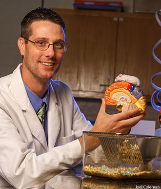 Liberty biology professor Dr. Gary Isaacs in research lab.