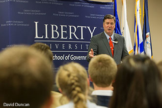 George Allen speaks to Liberty University government students.