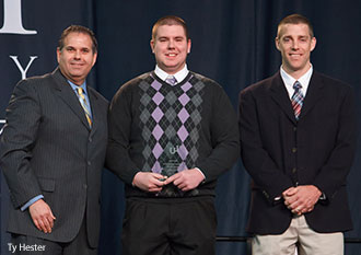 Liberty University presents Samuel Morrison with its 2014 CSER volunteer of the year award.