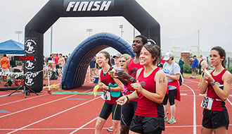 Liberty athletes during a home triathlon event in September 2013.