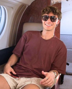 Photo of Ethan inside a plane